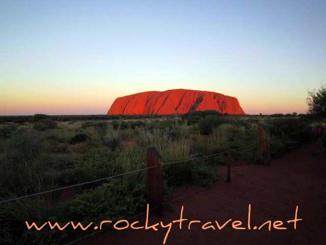visiting Uluru at sunset visiting Uluru at sunset